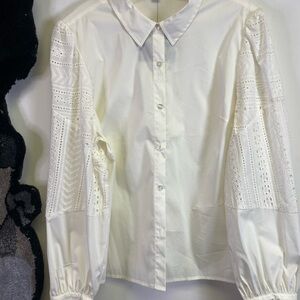 Marc New York (Andrew Marc) feminine and classic with modern statement sleeves.